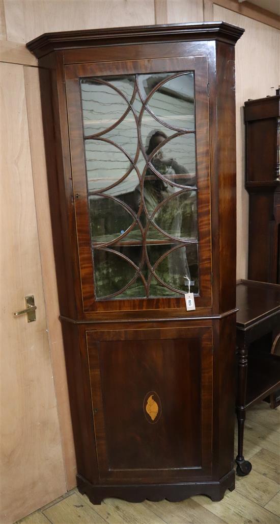 A George III mahogany standing corner cabinet H.206cm